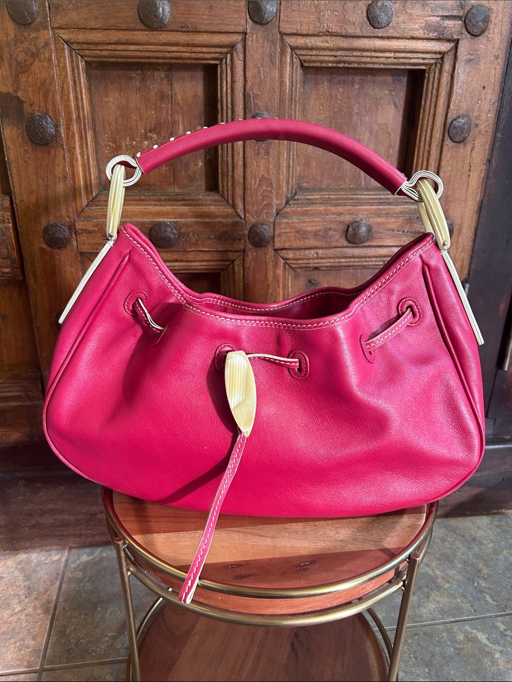 Tod's leather hobo bag, pink/cream color distinct design elements q 13 1/2” x 8”